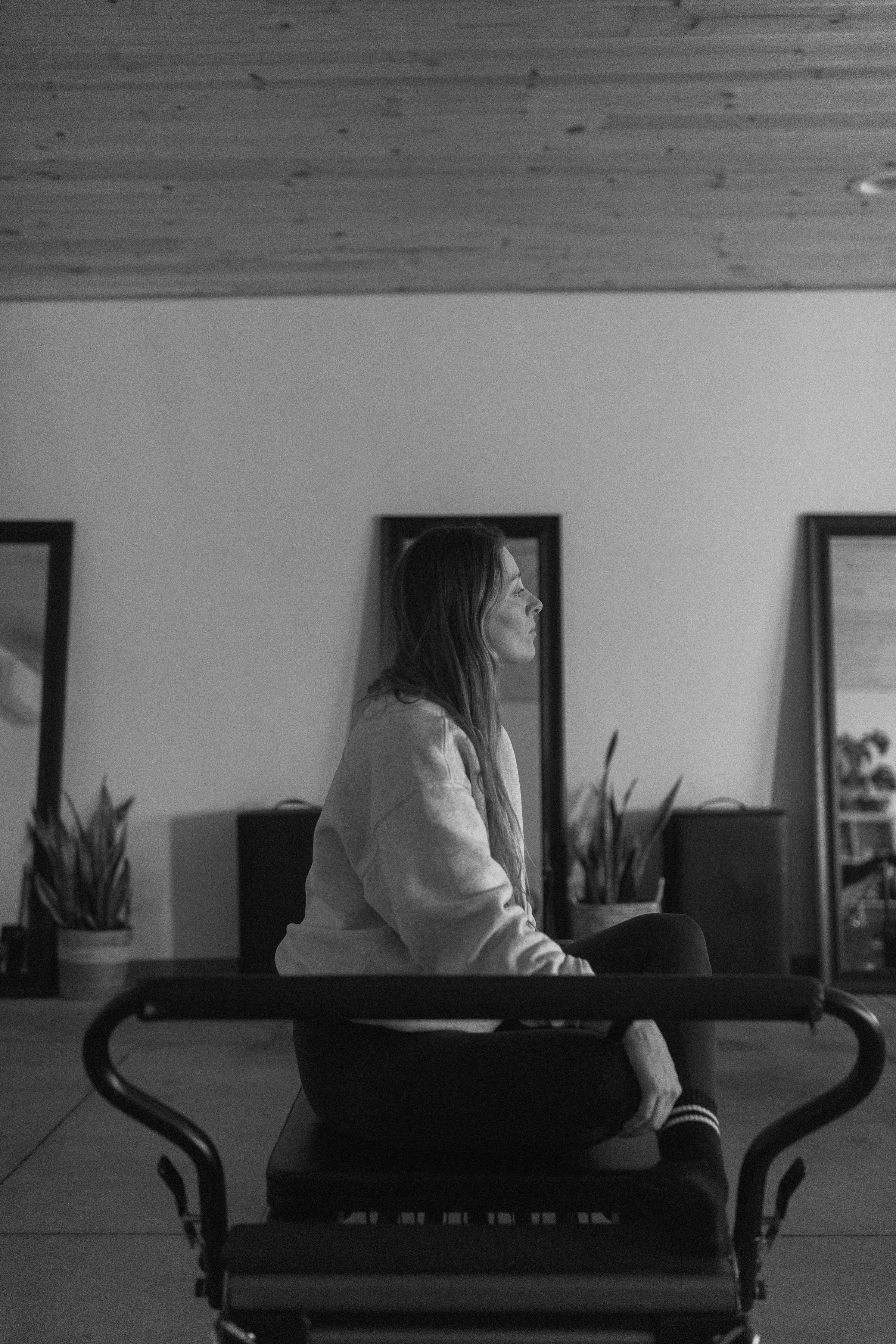 A quiet seated moment on a reformer at Yavu